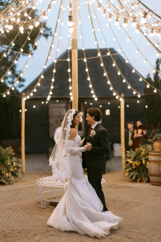 Couple dancing under the maypole at Preston Court.